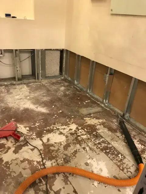 Frozen and split pipe damage in a Riverton basement
