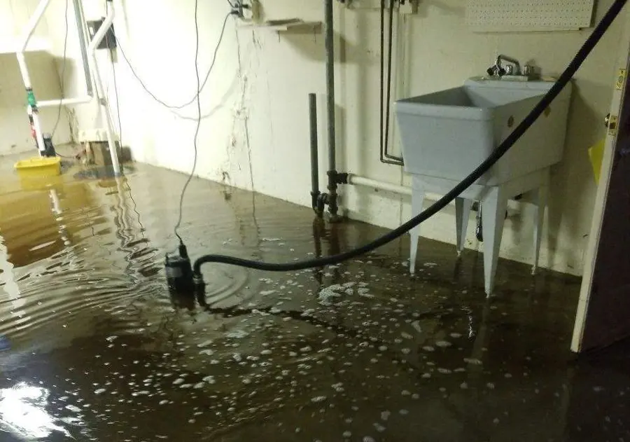 A failed sump pump and flooded pit in a Riverton basement